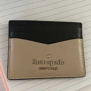 Beige and black Kate Spade card holder